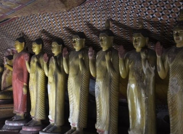 Standing Bhudda's. Notice the painted ceiling of the cave