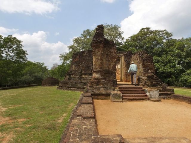 Paul inspecting the remnants of a building in Polonnaruwa
