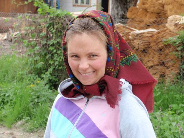 Paul took this photo of this lovely young woman who stopped to visit with us as we were walking in Breb